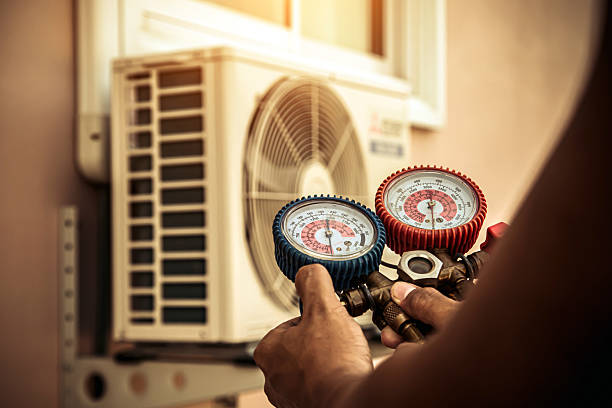 Professional Hvac technician working in Miller Place, NY